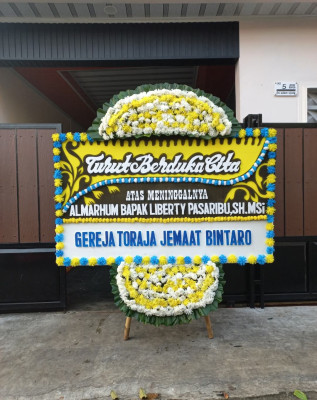 Papan Bunga Duka di Muncul